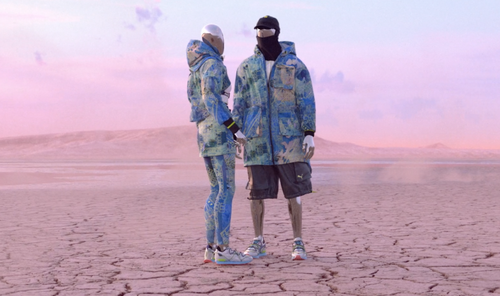 image of two digital fashion characters in the metaverse on a desert background