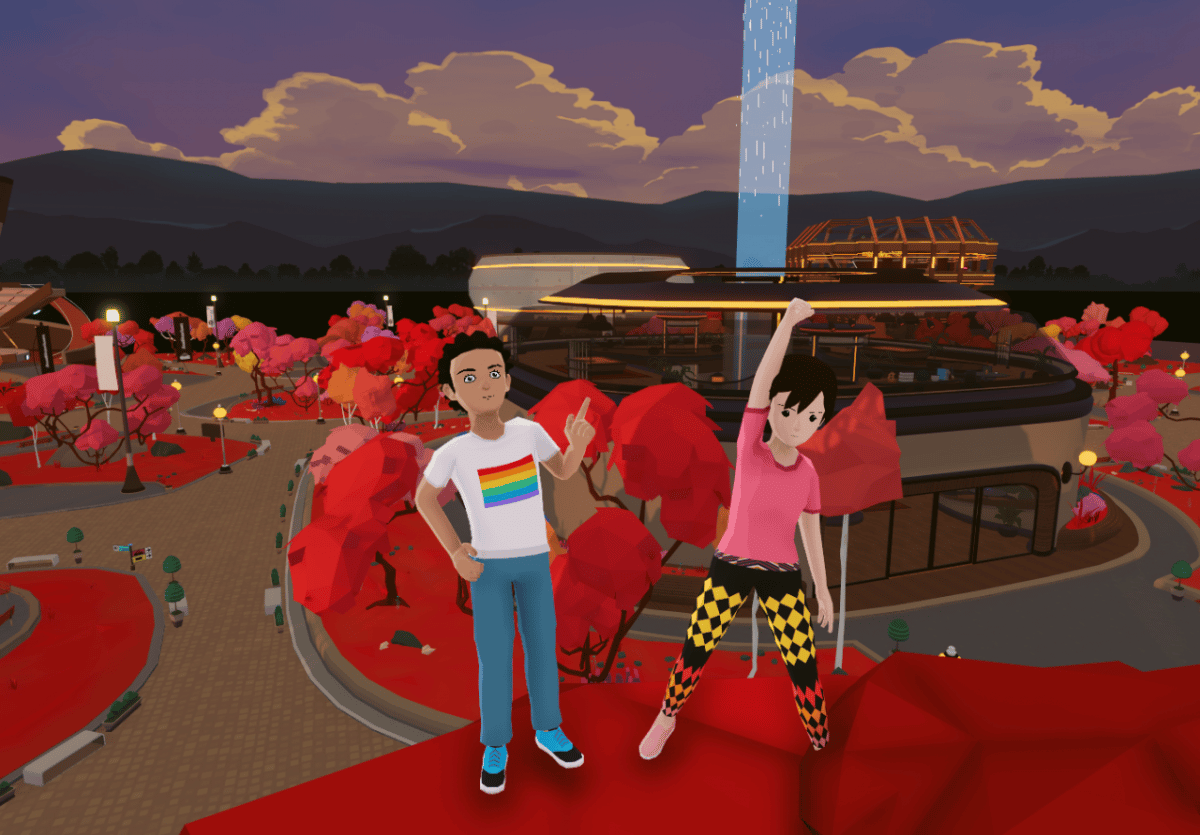 Two virtual avatars stand in front of an illuminated stadium, in support of the Decentraland Ugly Sweater Competition.